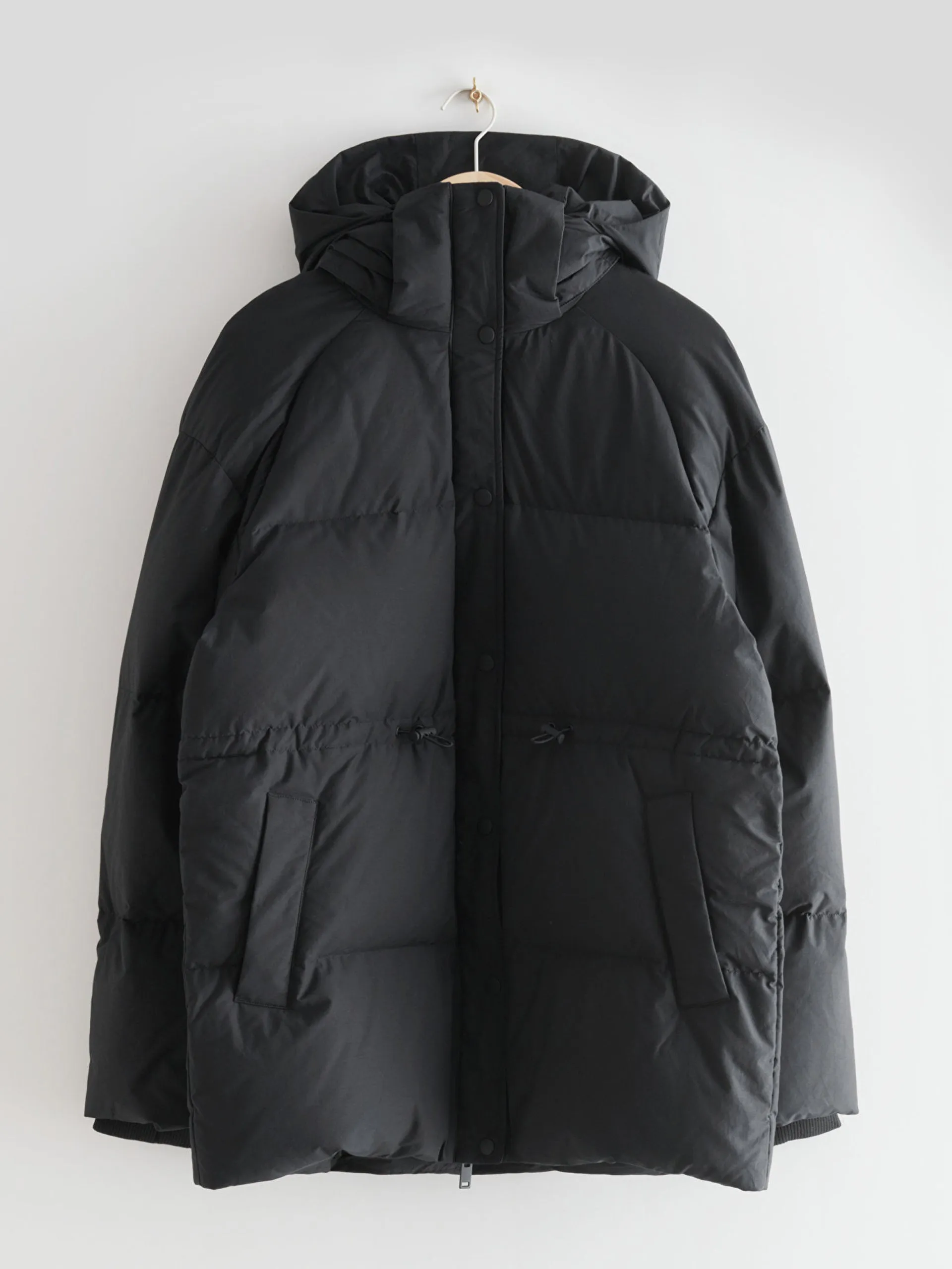 Black hooded puffer jacket